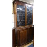 An Edwardian inlaid mahogany bookcase W.125cm