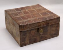 A 1920's crocodile collar box, 8in.