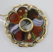 An early 20th century yellow metal and multi Scottish hardstone set brooch, 59mm.