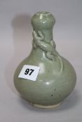 A Chinese celadon bottle vase H.15cm