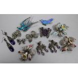 Twelve items of assorted marcasite jewellery, including enamel, brooches and earrings.