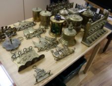 A collection of brass pipe racks and tobacco jars (Q)