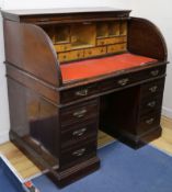 A late Victorian mahogany roll top desk W.122cm