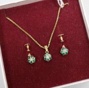 An emerald and diamond cluster pendant and a pair of earrings en suite, 9ct gold settings and