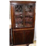 An inlaid mahogany corner glazed bookcase W.110cm