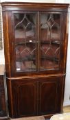 An inlaid mahogany corner glazed bookcase W.110cm