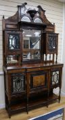 A rosewood cabinet with mirror