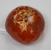 A small piece of facetted amber, weight 40 grams.