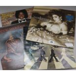 12 Vinyl records H 35cms