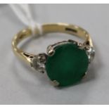 A 9ct gold, emerald and diamond three stone ring, size P.