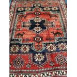 A Shiraz rug 260cm x 200cm