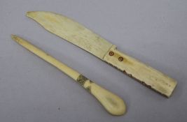 An Inuit snuff spoon, and a bone knife