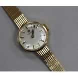 A lady's 9ct Tissot manual wind wrist watch.