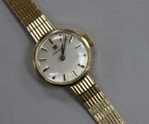 A lady's 9ct Tissot manual wind wrist watch.