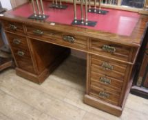 An Edwardian mahogany pedestal desk W.122cm