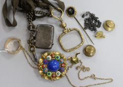 A 9ct gold buckle ring, a 9ct gold chain and other items including a silver vesta case.