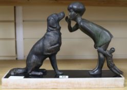 An Art Deco bronzed spelter of a girl and a dog 30cm.