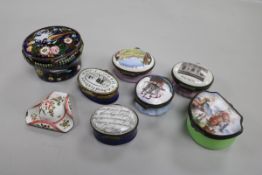 A collection of 19th century and later enamel snuff and patch boxes, and an enamelled model of a