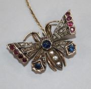 A Victorian gold, silver and gem set butterfly brooch, 37mm.