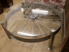 A painted wrought iron spoked wheel industrial coffee table W.123cm
