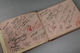 Winston Churchill and Clementine Churchill signatures c. 1935 contained in an autograph book.