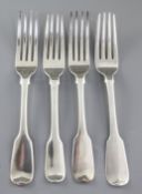A matched set of three George IV silver fiddle pattern table forks, hallmarked London 1825/28,