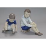 Two B & G figures of seated boys