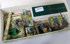 A quantity of Britains lead garden pieces, including flower beds, paving, rockery, flowers, lawn