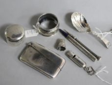 Eight assorted small silver items including a Georgian Scottish caddy spoon, a card case and