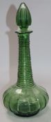 An early Victorian green glass spire decanter 32cm