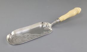 An Edwardian ivory handled silver crumb scoop, by Barker Brothers, hallmarked for Chester 1908, with