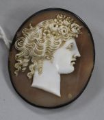 A 19ct century white metal mounted oval cameo brooch, carved with the bust of a lady, 48mm