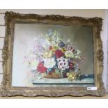 G Rockoil on canvasStill life of flowers in a basket on a ledgesigned and dated '5051 x 66cm.