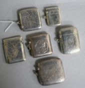 Six assorted silver vesta cases.