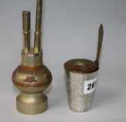 A Chinese nickel and copper travelling waterpipe, a scroll weight, a paperknife and a white metal