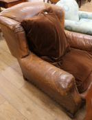 A 1930's French leather wing armchair