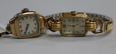 An 18ct gold lady's wrist watch and a 9ct gold lady's wrist watch.