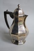 An Edwardian silver hot water pot, Thomas Bradbury & Sons, Sheffield, 1904, gross 17 oz.