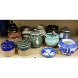 A Doulton stoneware leaf pattern tobacco jar and eleven other tobacco jars, various (12)