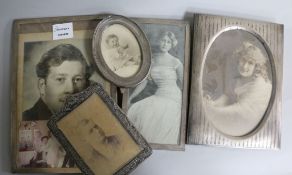 Five assorted silver mounted photograph frames.