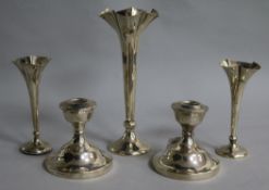 Three silver spill vases including small pair and a pair of silver dwarf candleholders (one af).