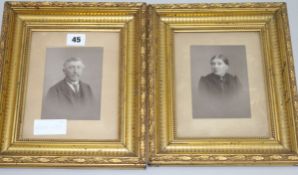 A pair of gilt framed black and white photographs
