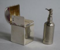 A silver miniature playing card box with hinged cover enclosing two compartments and a novelty