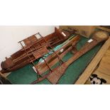 Two wooden models of boats and a carved four string instrument largest boat 86cm