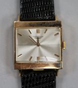 A 9ct gold Longines manual wind dress watch.