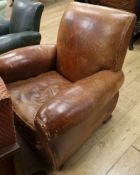 A 1930's French leather club armchair
