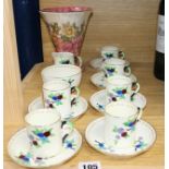 A Tuscan china fourteen piece coffee set and a Maling vase