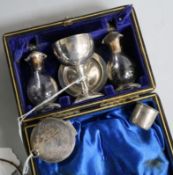 Ecclesiastical silver, including a travelling communion set, cased, a pyx box and a wafer box, the