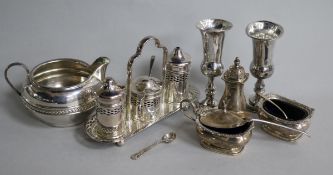 A silver jug, two condiment sets, two vases and a silver Kiddush cup.
