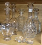 Five assorted glass decanters